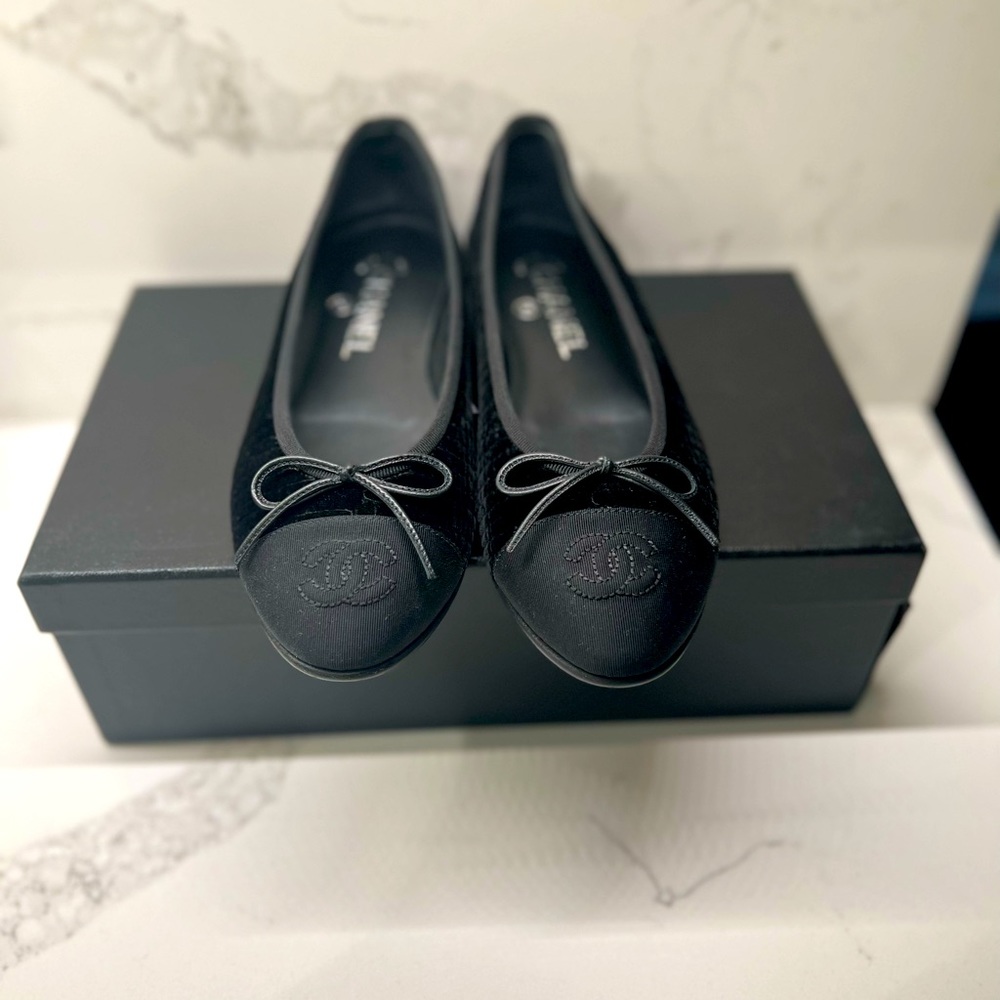 Chanel black velvet flats.